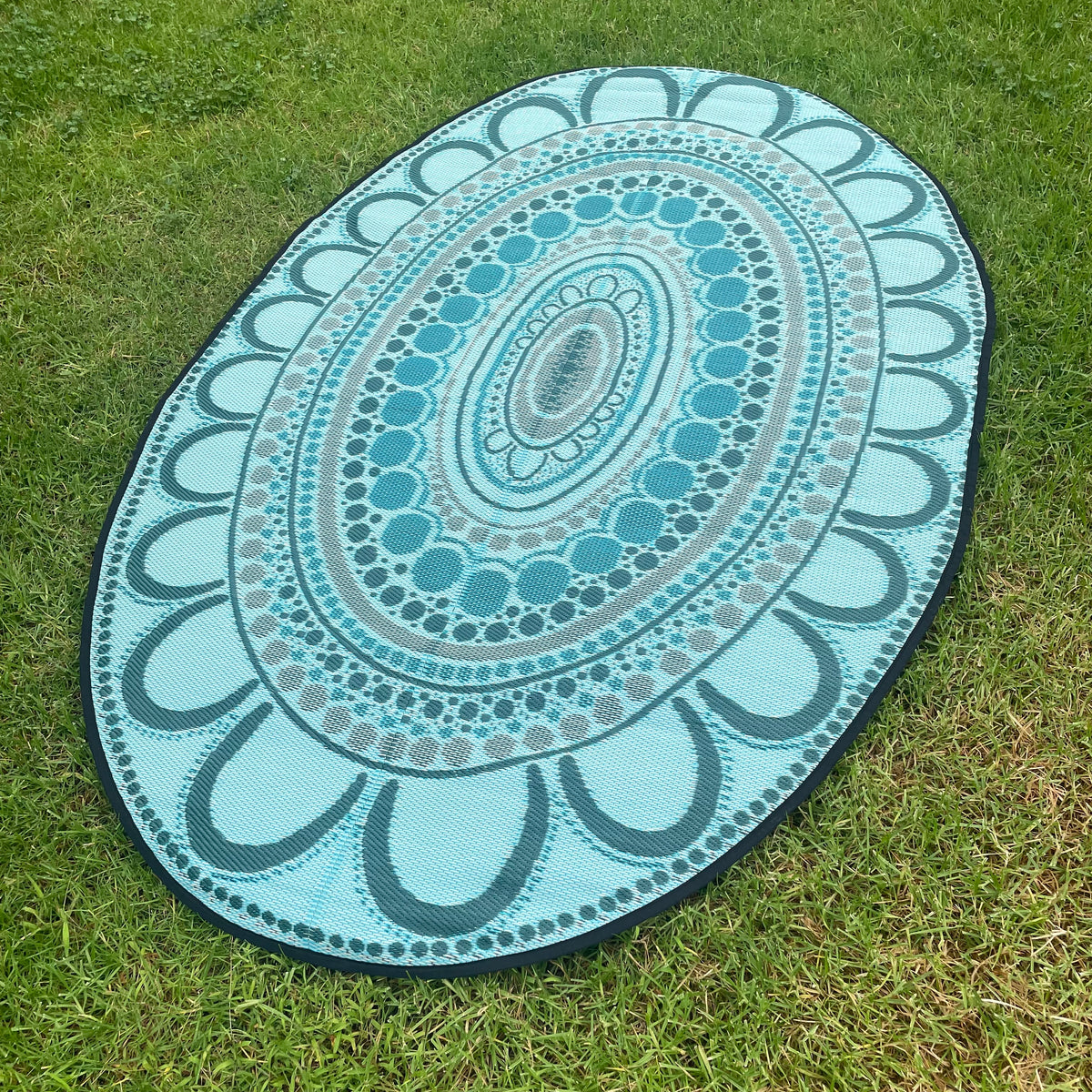Aboriginal Art Yarning Oval Outdoor Mat — in classroom use