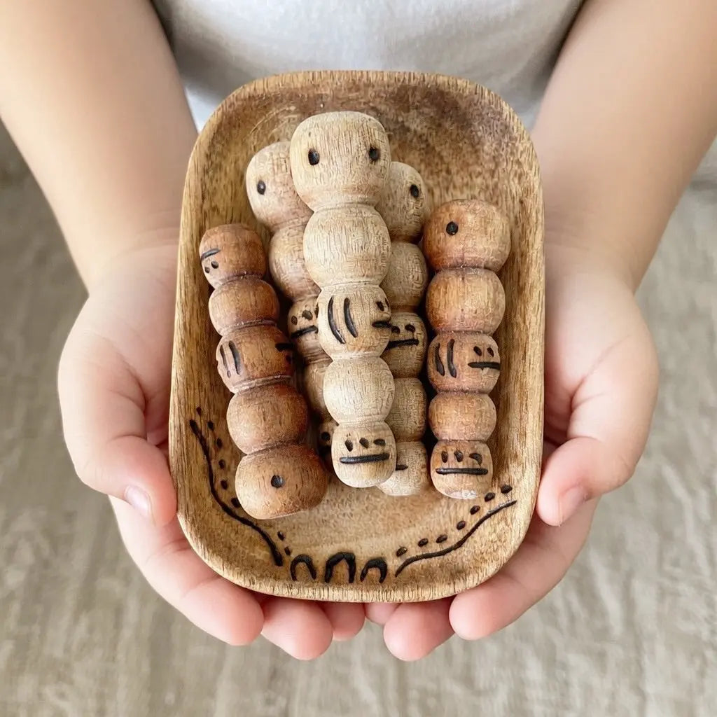 Bardi Grubs Handcarved — close-up of carved detail