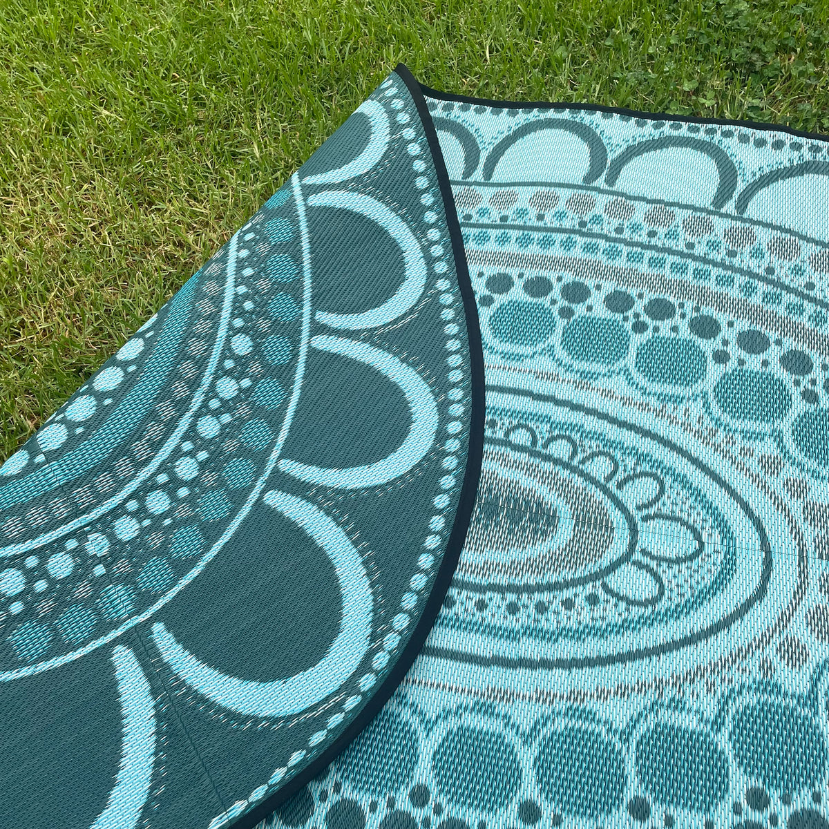 Aboriginal Art Yarning Oval Outdoor Mat — side view