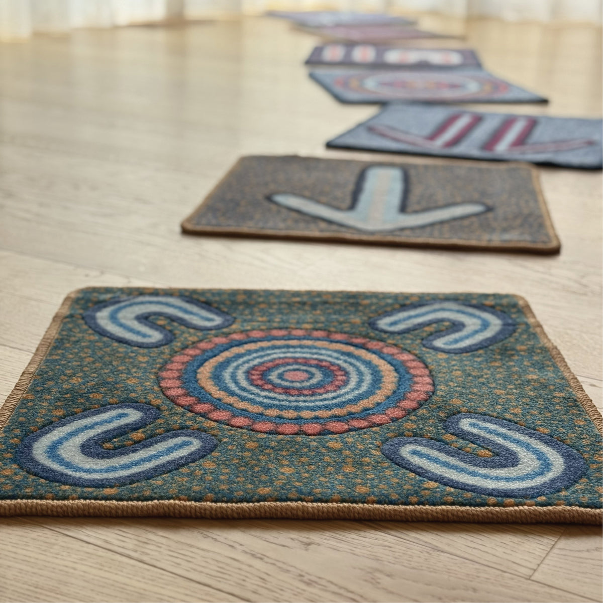 Indigenous Symbols Rug Squares — in classroom use