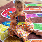 Serpents and Sticks Rug Game with soft Dice — in classroom use