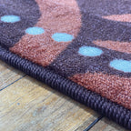 Alphabet Earth Serpent Indigenous Rug — in classroom use