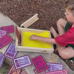 Aboriginal symbols sand drawing game